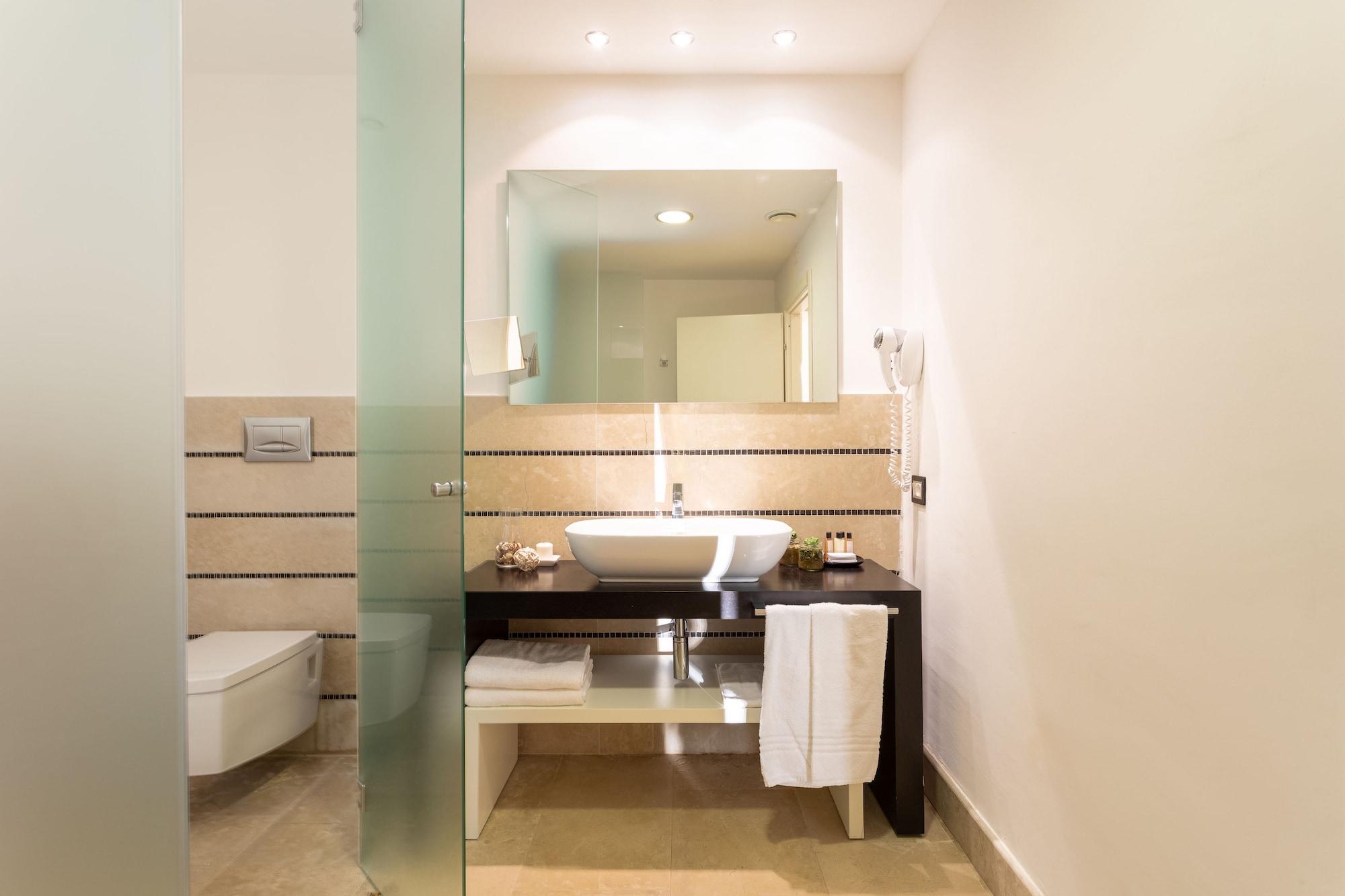 Borgo Di Luce I Monasteri Golf Resort & Spa Συρακούσες Εξωτερικό φωτογραφία Bathroom